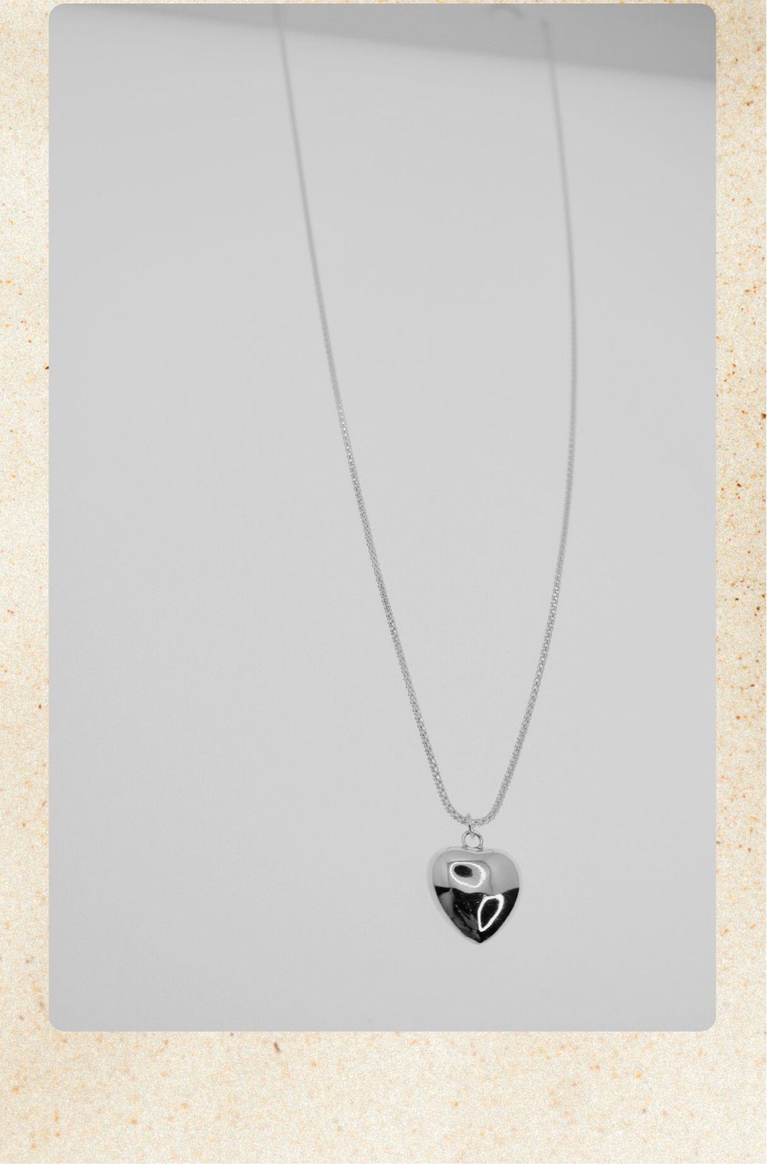 Collar corazón bombeado
